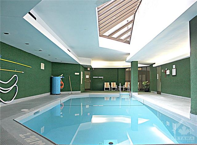 Main floor pool with skylight | Image 17