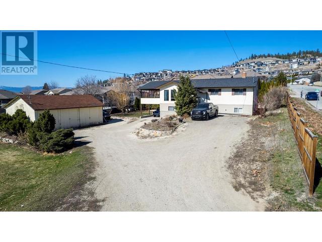 1584 Highway 33 E, House detached with 4 bedrooms, 2 bathrooms and 20 parking in Kelowna BC | Image 4