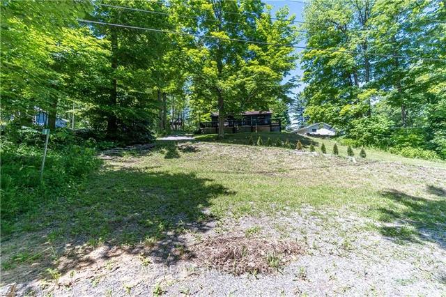 8 Fire Route 27, House detached with 2 bedrooms, 1 bathrooms and 4 parking in Trent Lakes ON | Image 30