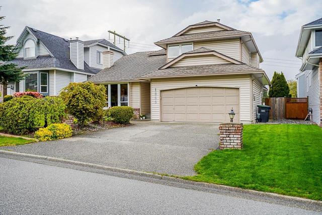 1855 Jacana Avenue, House detached with 3 bedrooms, 3 bathrooms and null parking in Port Coquitlam BC | Card Image