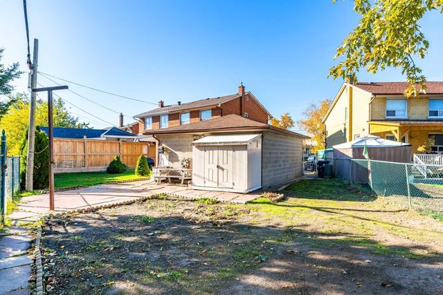 79 Talent Cres, House semidetached with 3 bedrooms, 2 bathrooms and 5 parking in Toronto ON | Image 22