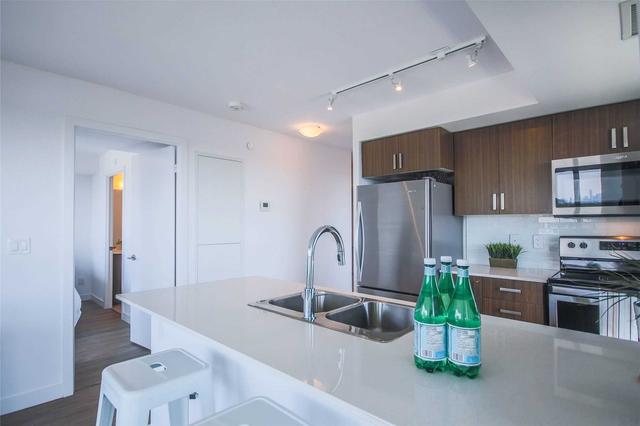 1019 - 8 Trent Ave, Condo with 2 bedrooms, 2 bathrooms and 1 parking in Toronto ON | Image 3