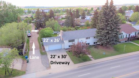 313 Main Street Nw, House detached with 6 bedrooms, 2 bathrooms and 5 parking in Airdrie AB | Card Image