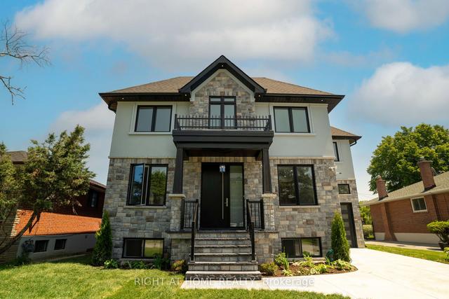 29 Brampton Rd, House detached with 4 bedrooms, 5 bathrooms and 3 parking in Toronto ON | Image 1