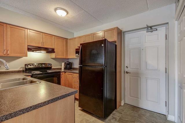 103 - 1360 Main St E, Townhouse with 1 bedrooms, 1 bathrooms and 2 parking in Milton ON | Image 17