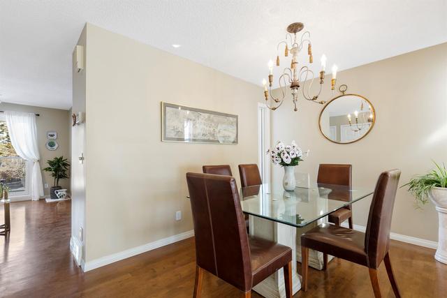 18 Stradwick Rise Sw, Home with 4 bedrooms, 2 bathrooms and 4 parking in Calgary AB | Image 11