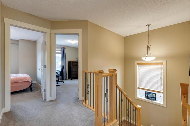 8924 Wentworth Avenue Sw, House detached with 4 bedrooms, 2 bathrooms and 2 parking in Calgary AB | Image 24