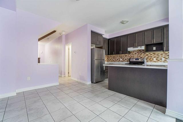 59 Davenfield Circ, House attached with 4 bedrooms, 3 bathrooms and 3 parking in Brampton ON | Image 3