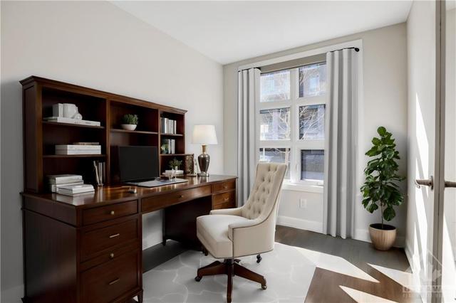 The main level offers the lovely bright den/office or 3rd bedroom | Image 22