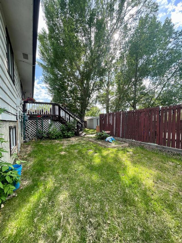 551 Queensland Circle Se, House detached with 4 bedrooms, 2 bathrooms and 2 parking in Calgary AB | Image 29