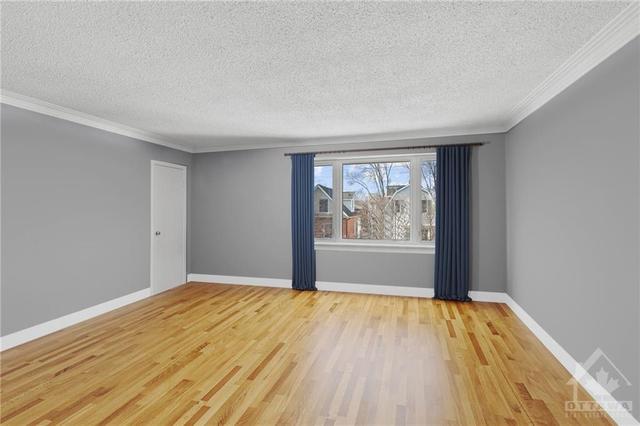 (Virtually Altered) 2nd Level 2 Bedroom Apt- Living room w/ expansive window and large closet. | Image 14