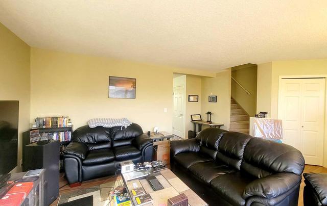 83 Lakeway Boulevard, Home with 3 bedrooms, 1 bathrooms and 2 parking in Sylvan Lake AB | Image 5