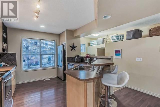 3074 New Brighton Gardens, House attached with 2 bedrooms, 2 bathrooms and 2 parking in Calgary AB | Image 5