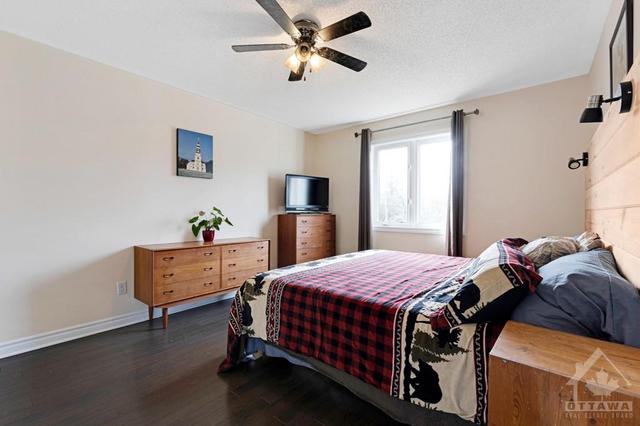 Main floor primary suite with big double closet | Image 16