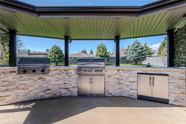Custom outdoor kitchen with Charcoal and Gas BBQ | Image 40