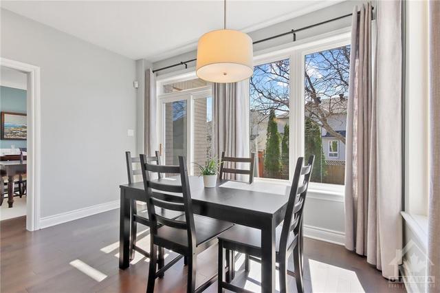 Sunfilled breakfast area w/direct views and access to your backyard | Image 10
