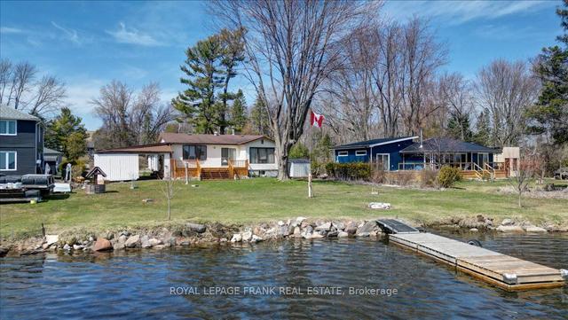 1111 Island View Dr, House detached with 2 bedrooms, 1 bathrooms and 8 parking in Otonabee South Monaghan ON | Image 1
