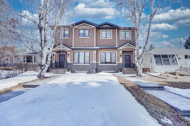 1235 Rosehill Drive Nw, Home with 4 bedrooms, 3 bathrooms and 2 parking in Calgary AB | Image 1