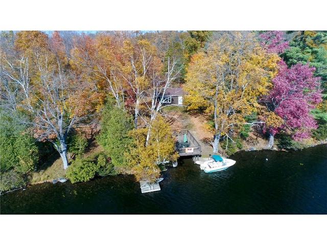 8 Elbow  Scott Island, House detached with 2 bedrooms, 1 bathrooms and 4 parking in Rideau Lakes ON | Card Image