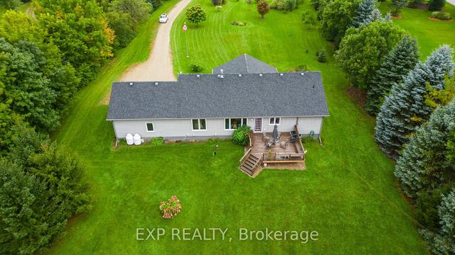 7359 Sideroad 12, House detached with 3 bedrooms, 2 bathrooms and 8 parking in Mapleton ON | Image 2