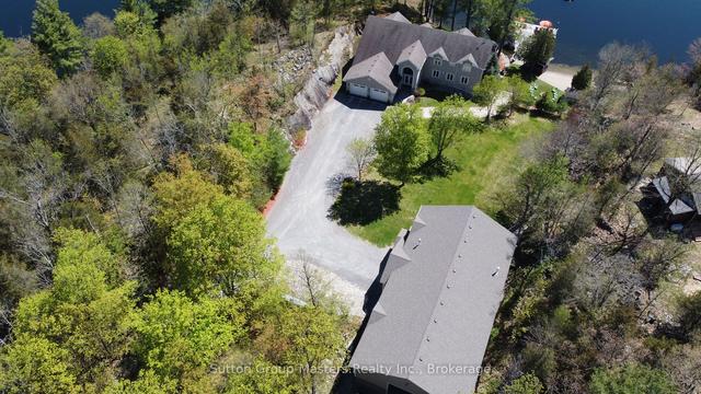 5058 Rock Cliff Lane, House detached with 3 bedrooms, 5 bathrooms and 24 parking in South Frontenac ON | Image 23