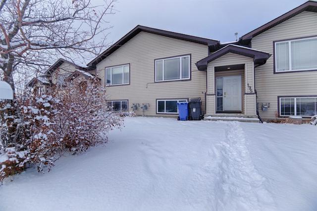 195 Blackfoot Boulevard W, Home with 4 bedrooms, 2 bathrooms and 2 parking in Lethbridge County AB | Image 7