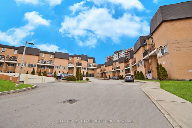 1028 - 100 Mornelle Crt, Townhouse with 2 bedrooms, 2 bathrooms and 1 parking in Toronto ON | Image 1
