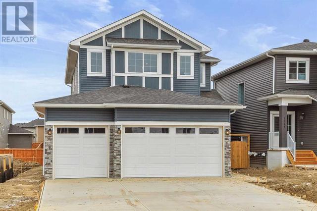 1347 Scarlett Ranch Boulevard, House detached with 3 bedrooms, 2 bathrooms and 6 parking in Carstairs AB | Image 2