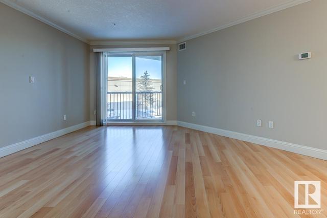 213 - 13111 140 Av Nw, Condo with 2 bedrooms, 2 bathrooms and 2 parking in Edmonton AB | Image 2