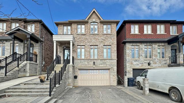100 Falstaff Ave, House detached with 4 bedrooms, 4 bathrooms and 5.5 parking in Toronto ON | Image 1