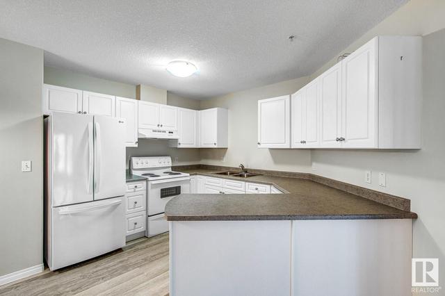 306 - 9930 100 Av, Condo with 2 bedrooms, 2 bathrooms and 1 parking in Fort Saskatchewan AB | Image 15