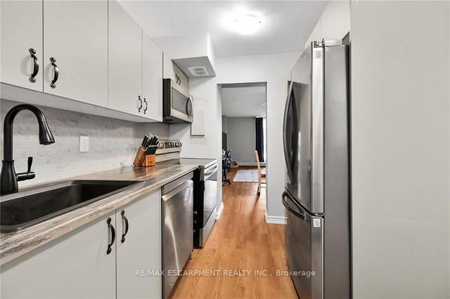 116 - 350 Quigley Rd, Townhouse with 3 bedrooms, 1 bathrooms and 1 parking in Hamilton ON | Image 32