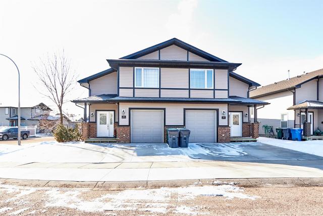 103 Hamptons Way Se, Home with 3 bedrooms, 3 bathrooms and 4 parking in Medicine Hat AB | Image 1