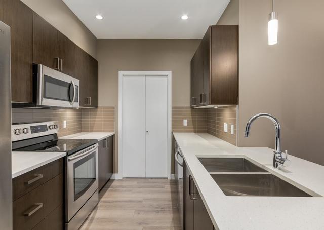 312 - 28 Auburn Bay Link Se, Condo with 2 bedrooms, 2 bathrooms and 2 parking in Calgary AB | Image 6