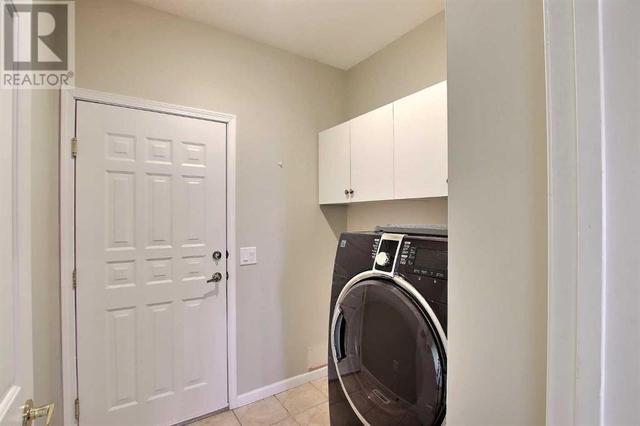Laundry and Garage  access | Image 19
