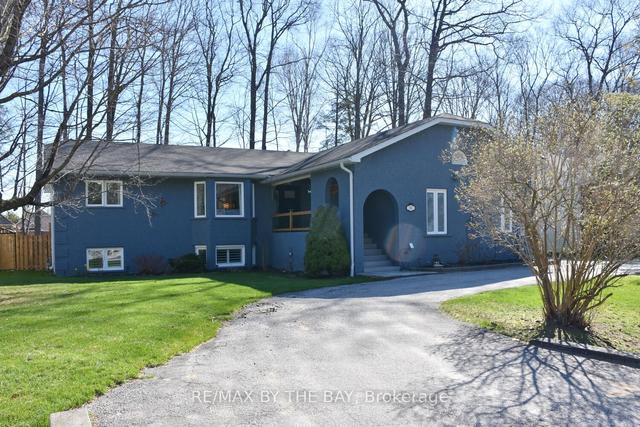 52 Downer Cres, House detached with 4 bedrooms, 4 bathrooms and 9 parking in Wasaga Beach ON | Image 1