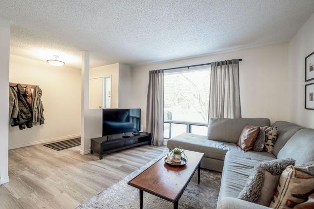 107 - 2300 Oakmoor Drive Sw, Home with 3 bedrooms, 1 bathrooms and 1 parking in Calgary AB | Image 6