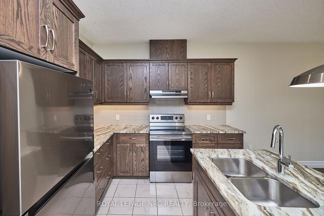 115 Borden Tr, Townhouse with 2 bedrooms, 2 bathrooms and 4 parking in Welland ON | Image 34