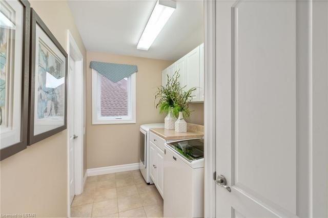Upstairs laundry with direct access from Master Bedroom through walk-thru closet. | Image 36