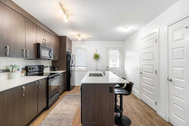 1315 Auburn Bay Circle Se, Home with 2 bedrooms, 2 bathrooms and 3 parking in Calgary AB | Image 35