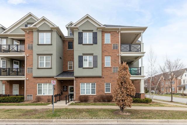 304 - 2333 Sawgrass Dr, Townhouse with 2 bedrooms, 2 bathrooms and 2 parking in Oakville ON | Image 1