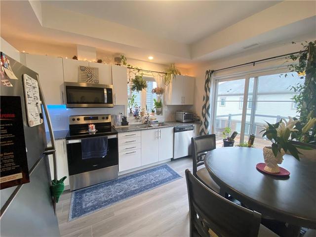 46 - 205 West Oak Trail, House attached with 2 bedrooms, 1 bathrooms and 2 parking in Kitchener ON | Image 11