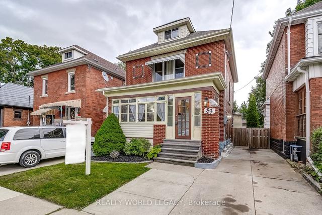83 Graham Ave S, House detached with 4 bedrooms, 3 bathrooms and 5 parking in Hamilton ON | Image 1