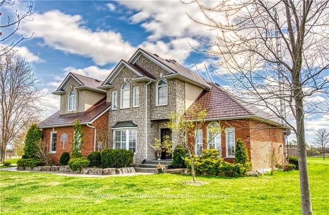 698 Broman Crt, House detached with 4 bedrooms, 4 bathrooms and 12 parking in West Lincoln ON | Image 1
