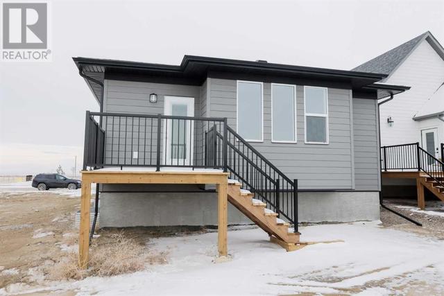 1121 Abitibi Road W, House detached with 4 bedrooms, 2 bathrooms and 4 parking in Lethbridge AB | Image 2