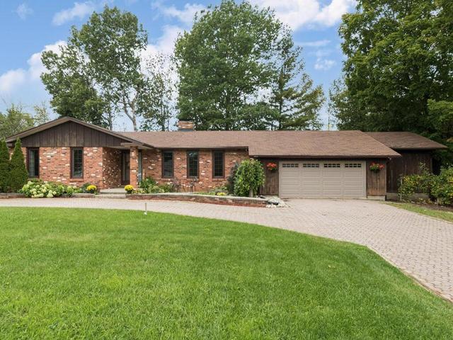 8 Cedar Lane, House detached with 4 bedrooms, 3 bathrooms and 5 parking in Rideau Lakes ON | Image 1