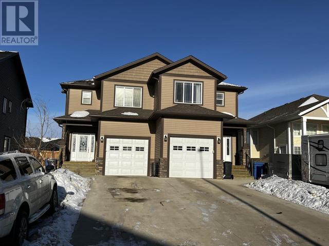11012 104a Avenue, House attached with 3 bedrooms, 3 bathrooms and null parking in Fort St. John BC | Card Image