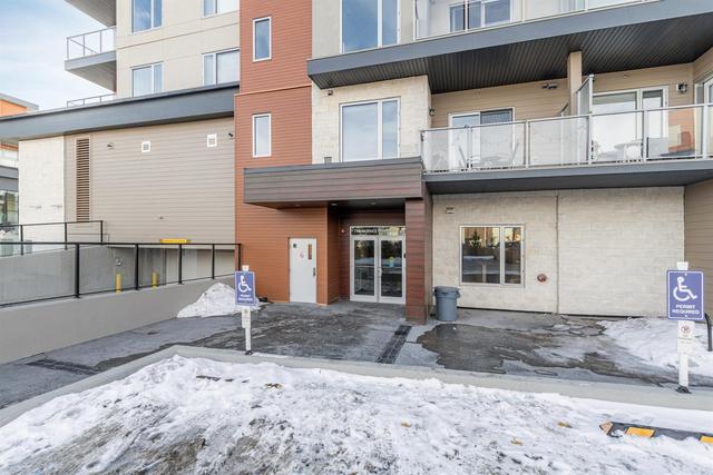 304 - 71 Shawnee Common Sw, Condo with 2 bedrooms, 2 bathrooms and 1 parking in Calgary AB | Image 18