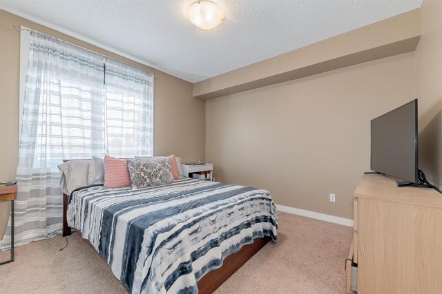 401 - 2419 Centre Street Nw, Condo with 2 bedrooms, 2 bathrooms and 1 parking in Calgary AB | Image 12