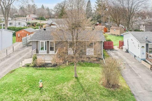 52 Eastern Ave, House detached with 3 bedrooms, 1 bathrooms and 5 parking in New Tecumseth ON | Image 1